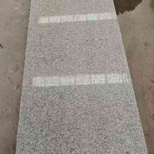 广元芝麻白光面毛板