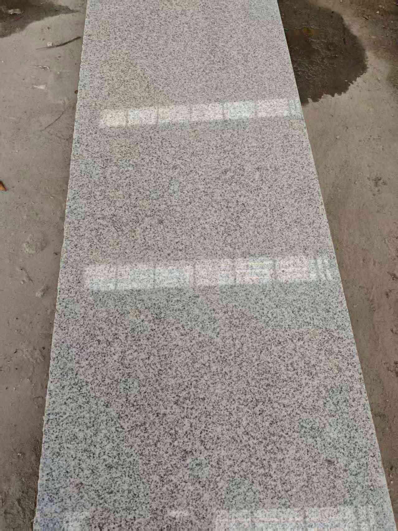 广元芝麻白光面毛板